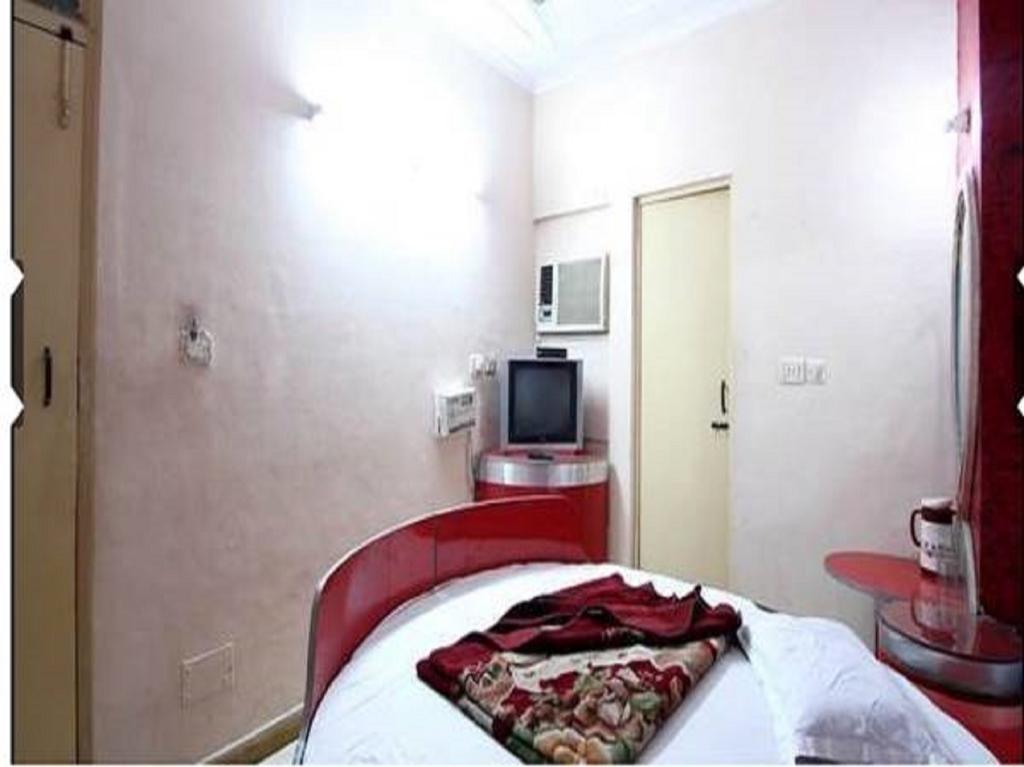 Hotel Hans International Új-Delhi Szoba fotó